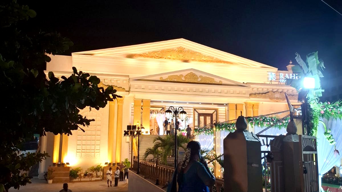 Illuminated function hall entrance in Tirupati on the evening of a wedding catered by Sri Amrutha